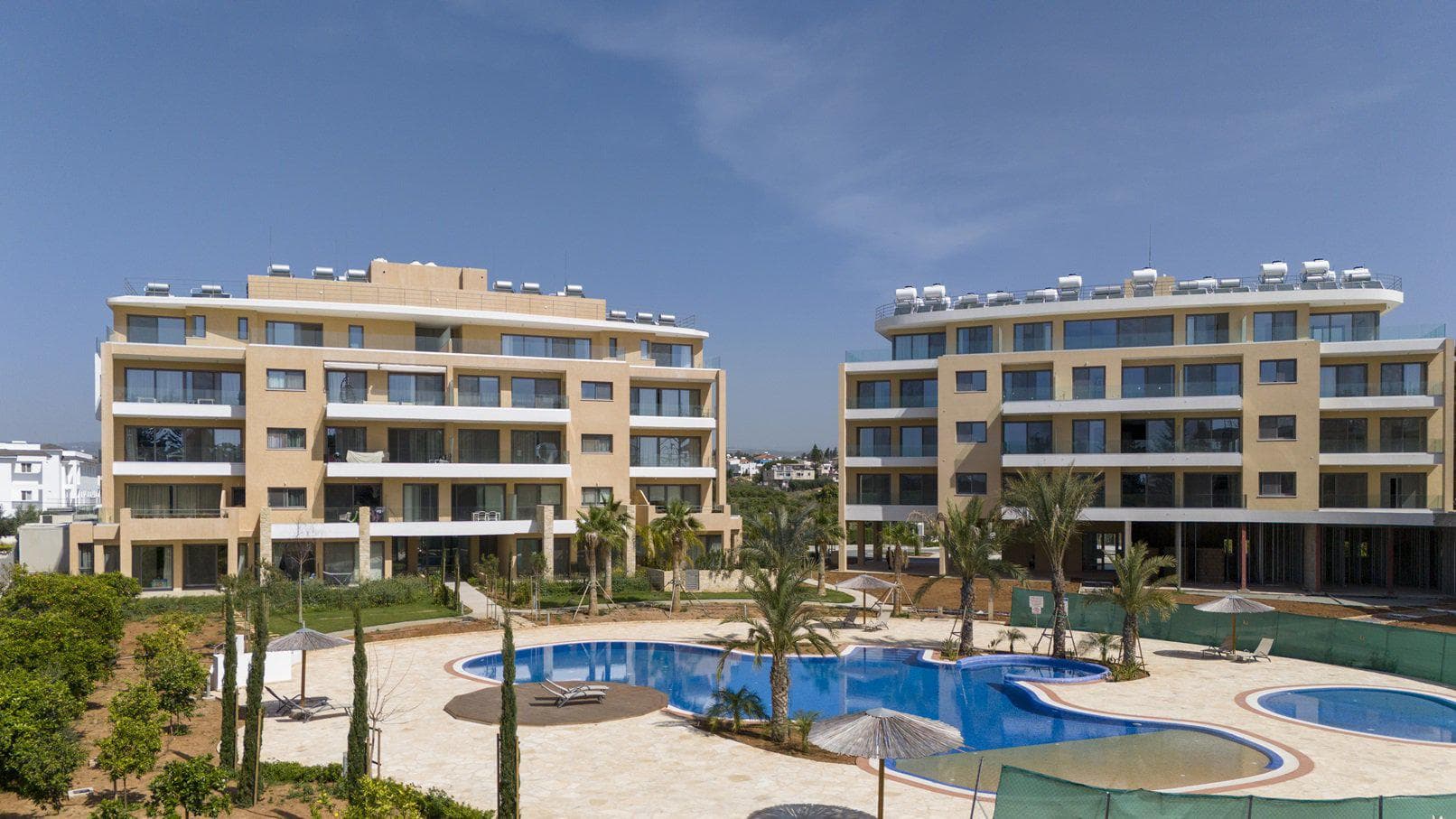 Gated community with swimming pools and gardens near the coast and golf club, Limassol