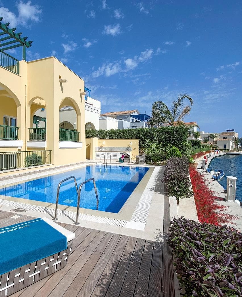 Villas with private docks and swimming pools in a luxury residence on an island, Limassol