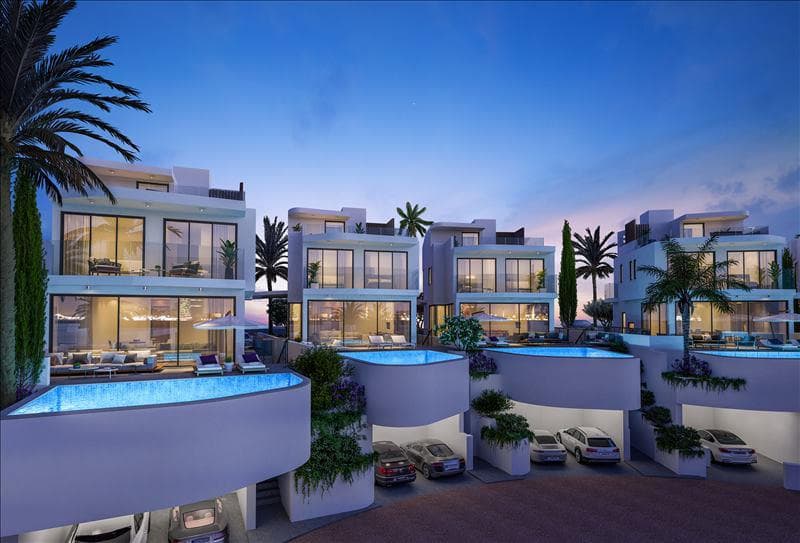 Luxury beachfront villas with swimming pools and gardens