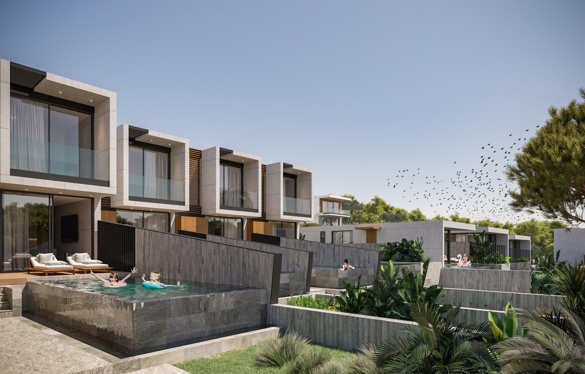 Modern complex of villas with swimming pools and gardens
